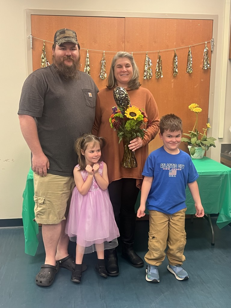family posing for picture