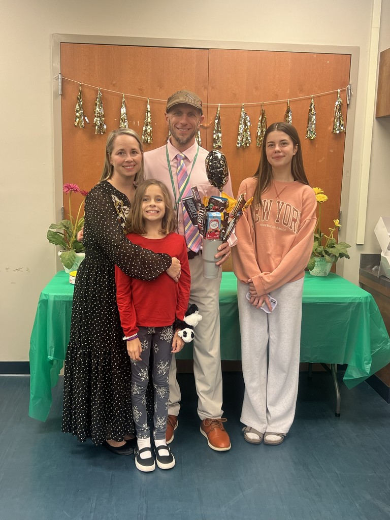 family posing for picture