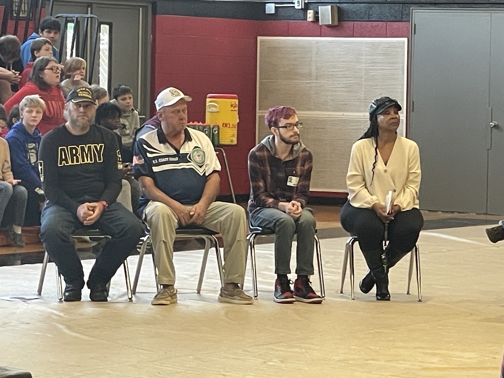 Panel of veterans answering questions.