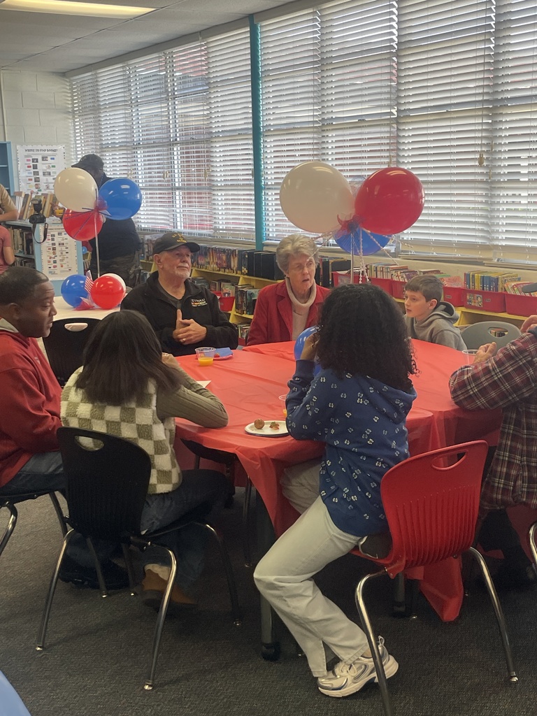 Vets and families at reception.