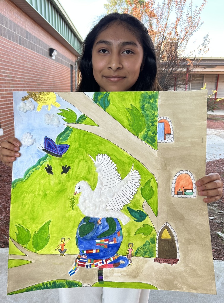 Congratulations  to Yisleni Rodriguez Salinas holding her prized artwork for the Lions International Peace Contest.