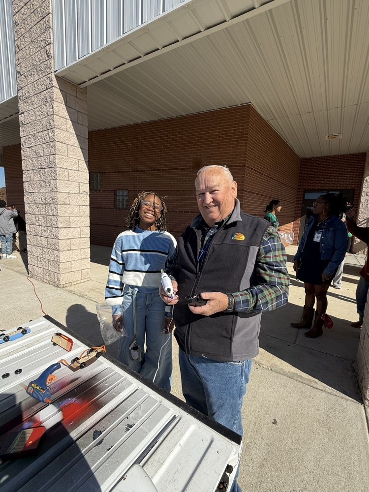 people smiling and posing for a picture 