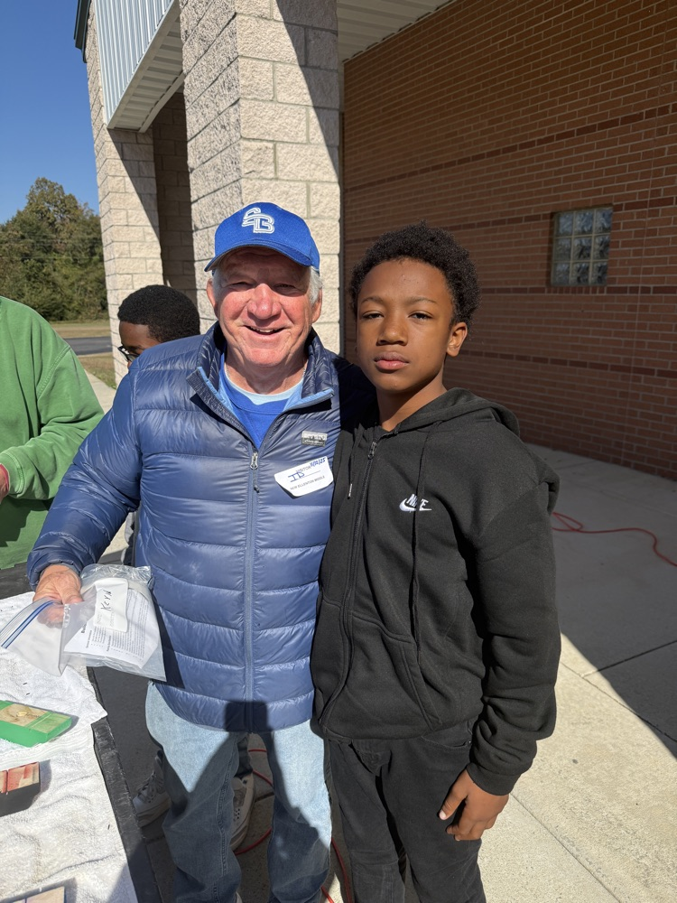 people smiling and posing for a picture 