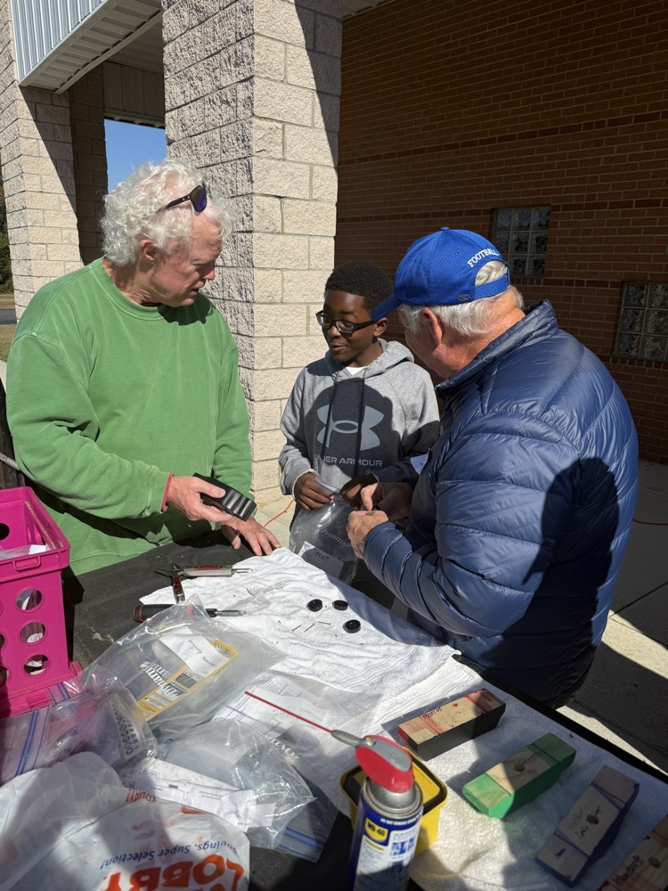 people smiling and posing for a picture 