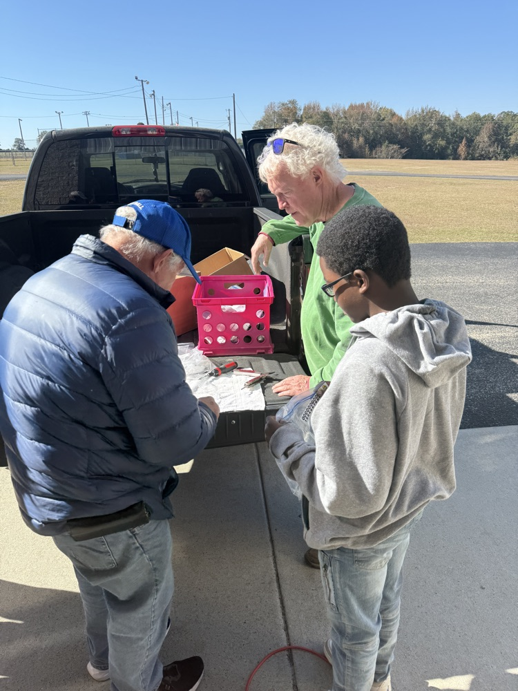 people smiling and posing for a picture 