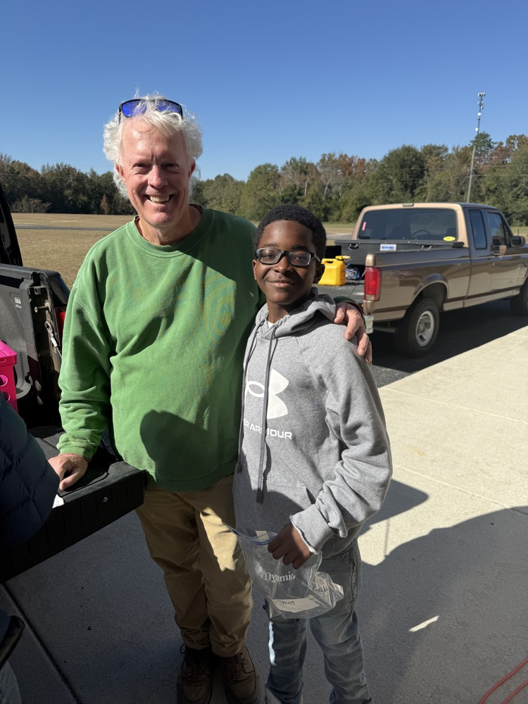 people smiling and posing for a picture 