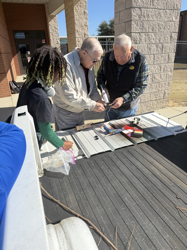 people smiling and posing for a picture 