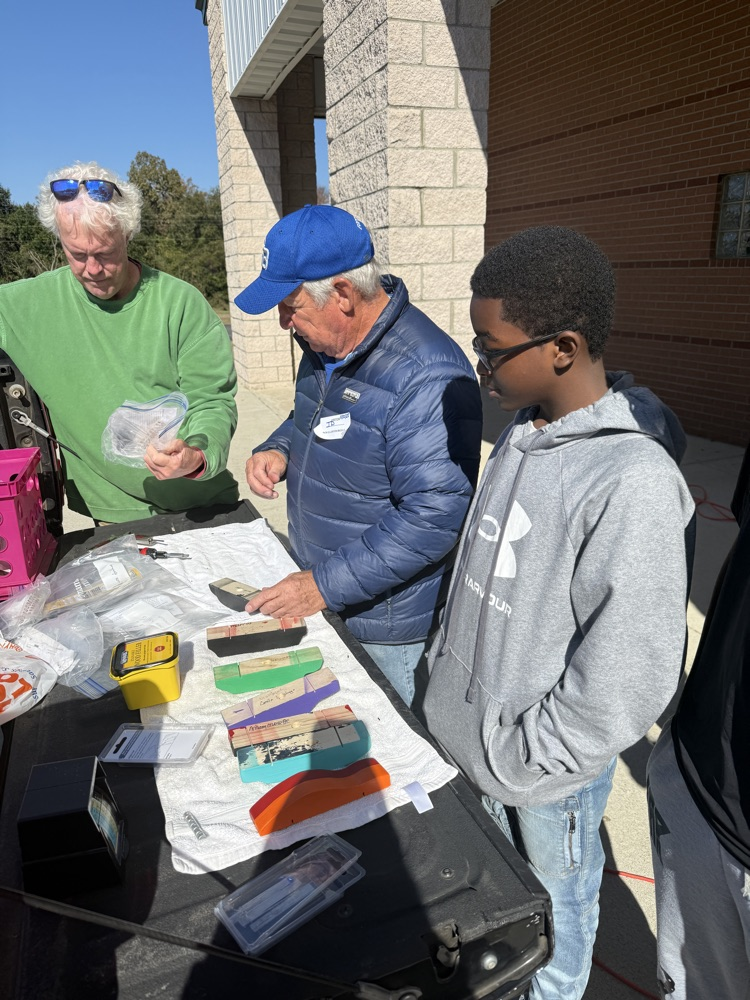 people smiling and posing for a picture 