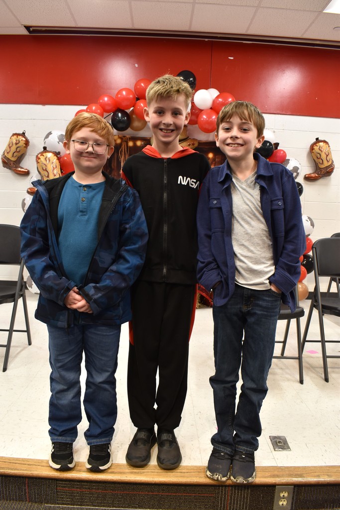 Top three spellers in spelling bee.