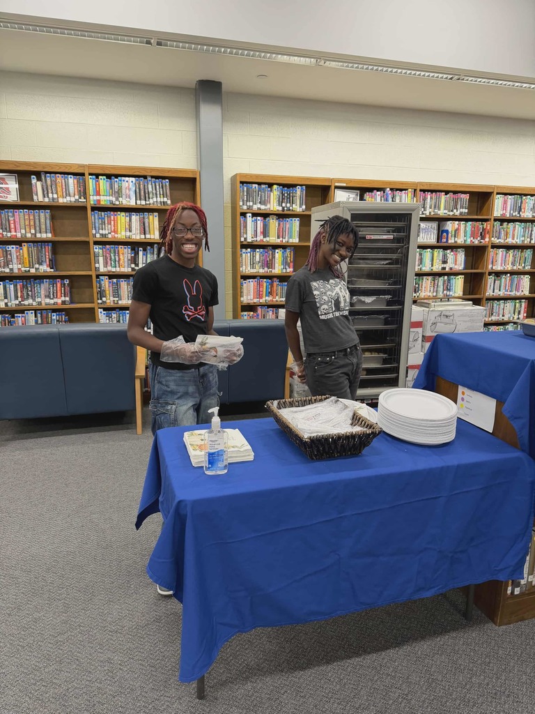 Culinary students helping serve lunch