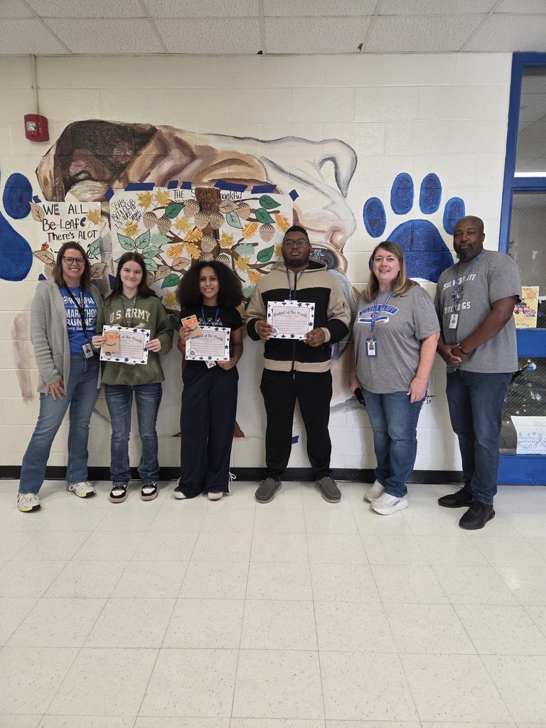 November Students of the Month posing with Administration