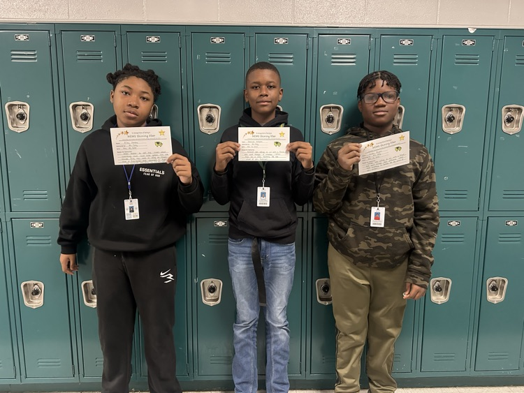 student posing with certificate 