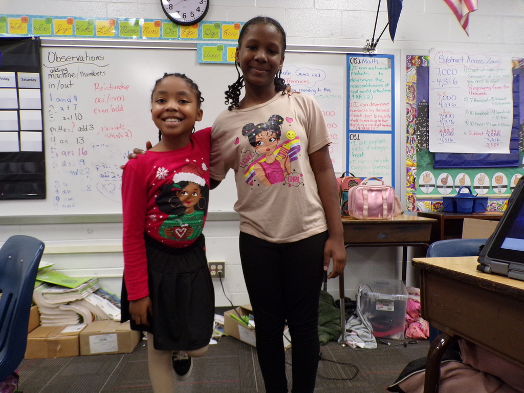 STudents wearing holiday shirts.