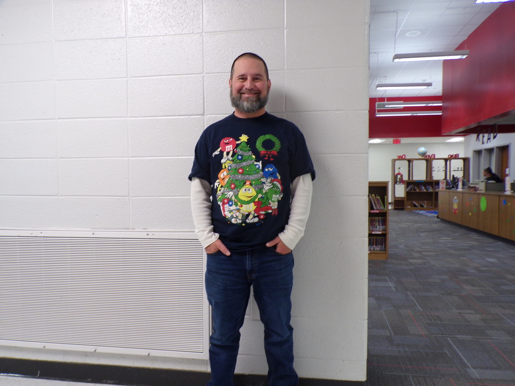 Staff wearin gholiday shirt.