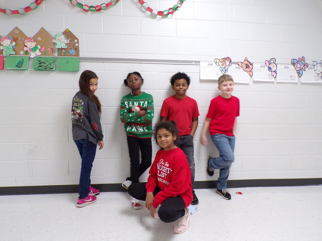 STudents wearing holiday shirts.