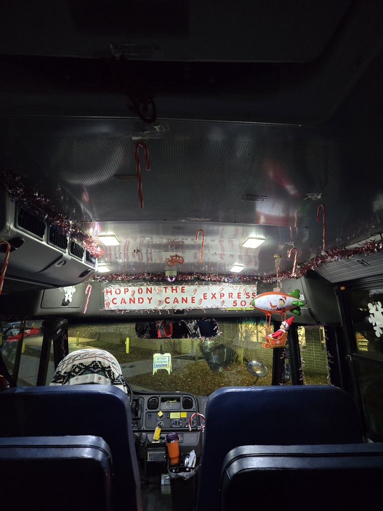 Inside of bus decorated for Christmas.