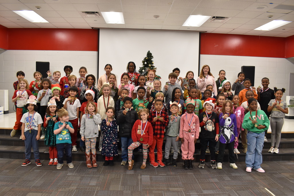 Runners with medals.