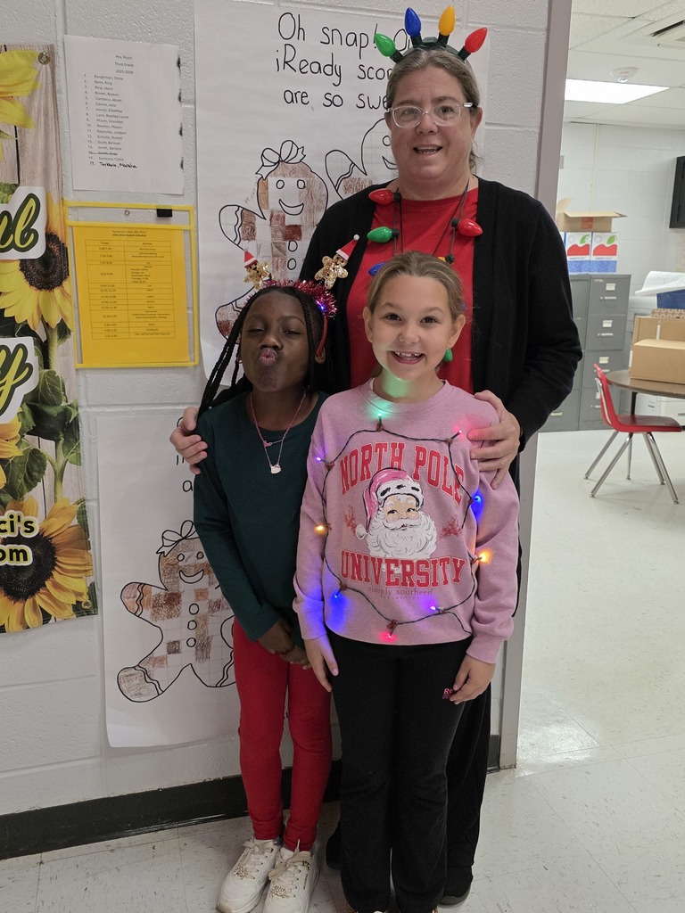 Students and staff dressed in lights.