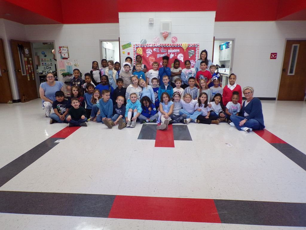 Students and staff dressed in blue and white.