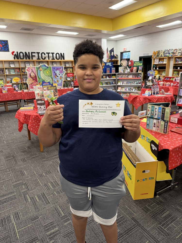 students holding a certificate and smiling 