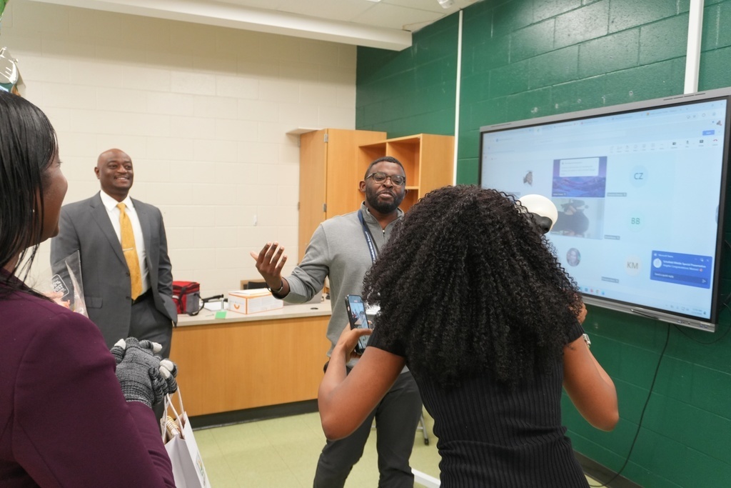 Teacher Arrington Weston is surprised as a Teacher of the Year Honor Court Member.