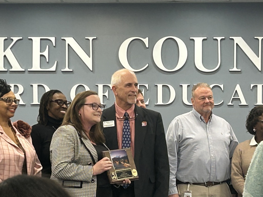 Mrs. Brooks being recognized at the School Board Meeting.