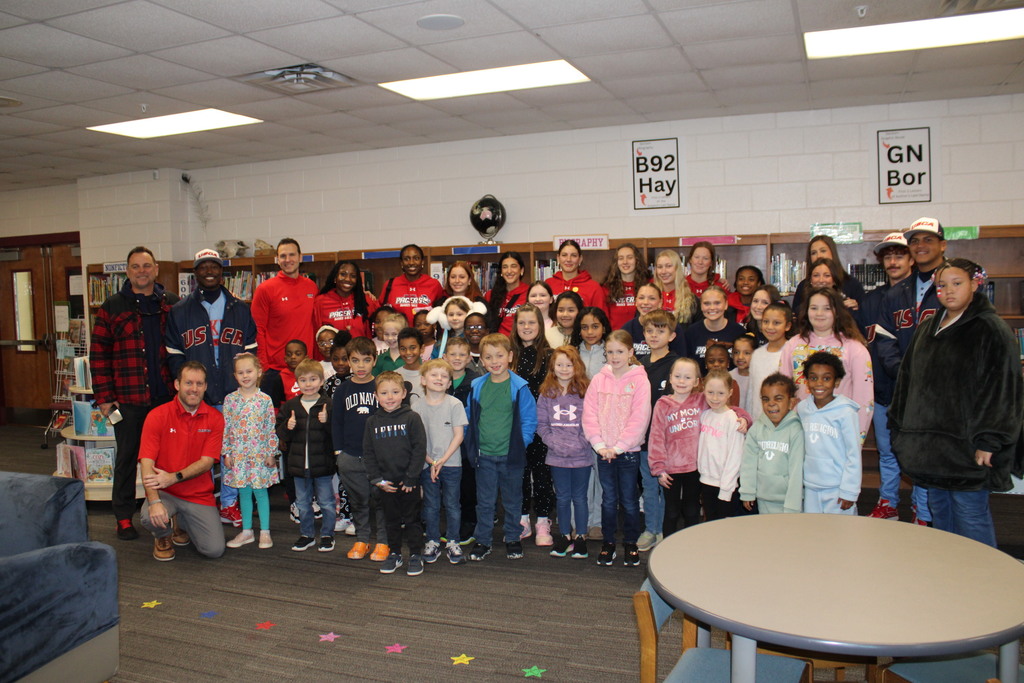 Read with the Pacers reading challenge completers with representatives from USC-A.