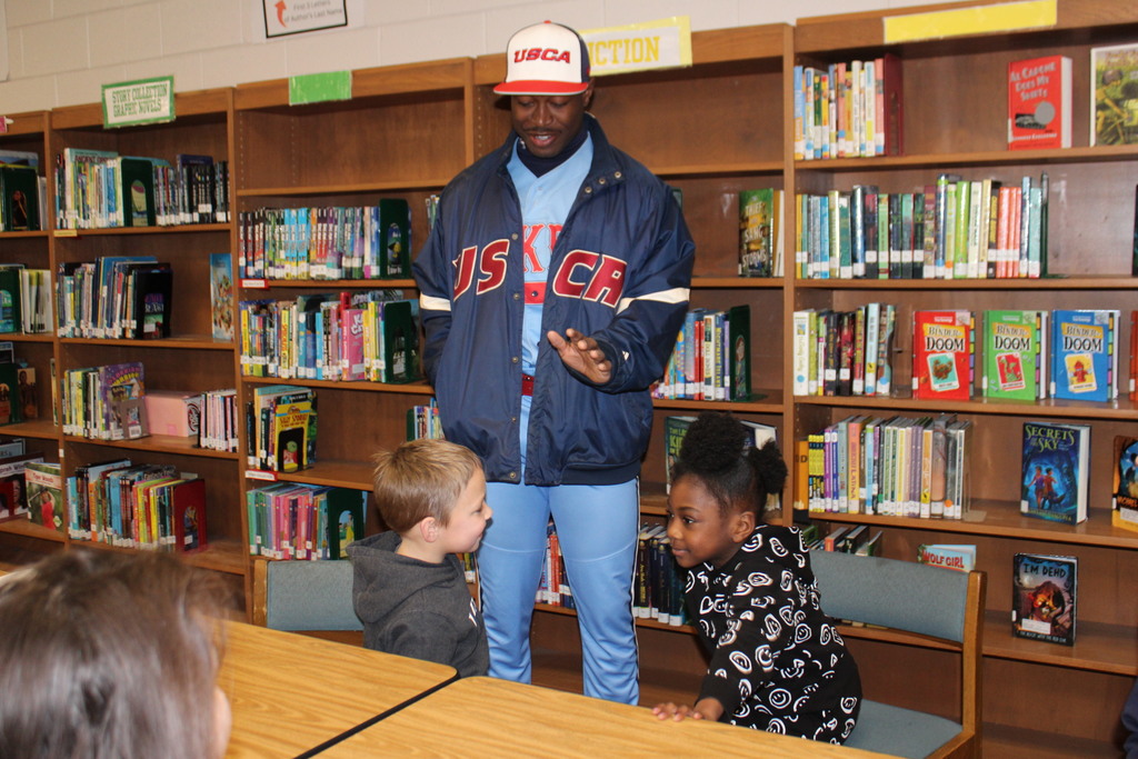 Read with the Pacers reading challenge completers with representatives from USC-A.