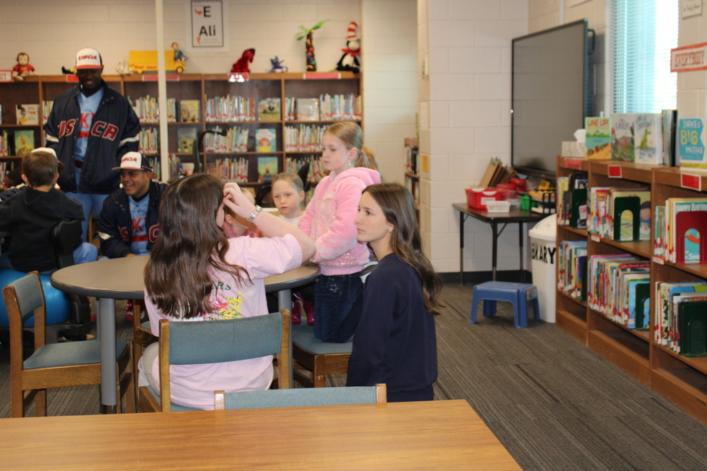 Read with the Pacers reading challenge completers with representatives from USC-A.