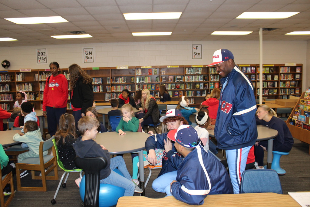Read with the Pacers reading challenge completers with representatives from USC-A.