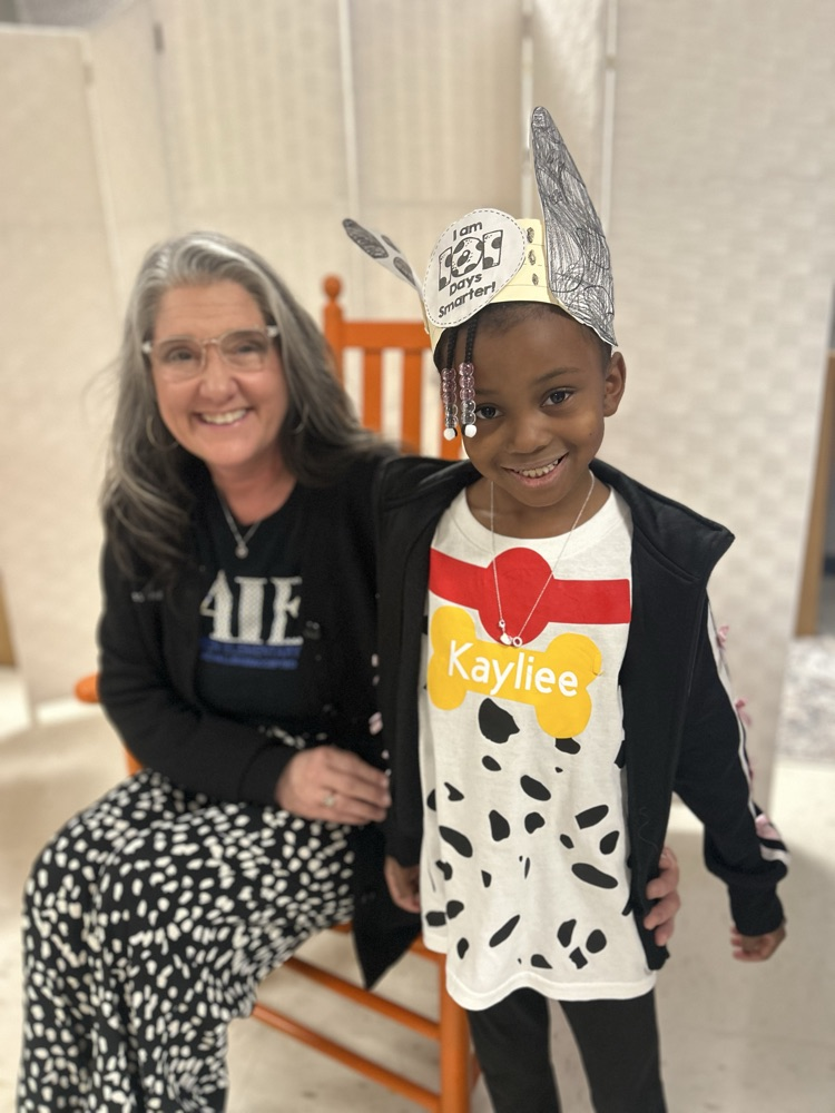 dressed as Dalmatians with black and white spots