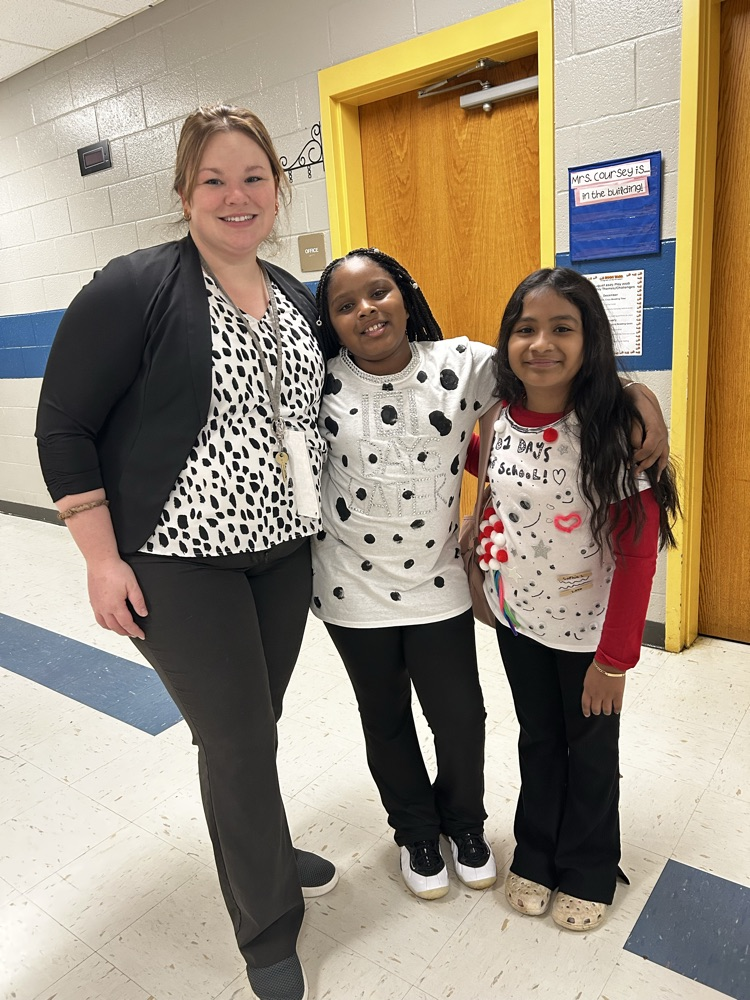 dressed as Dalmatians with black and white spots