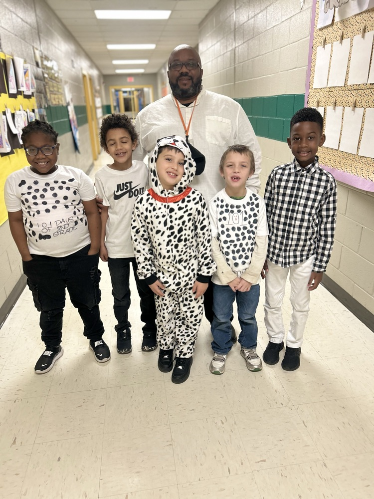 dressed as Dalmatians with black and white spots