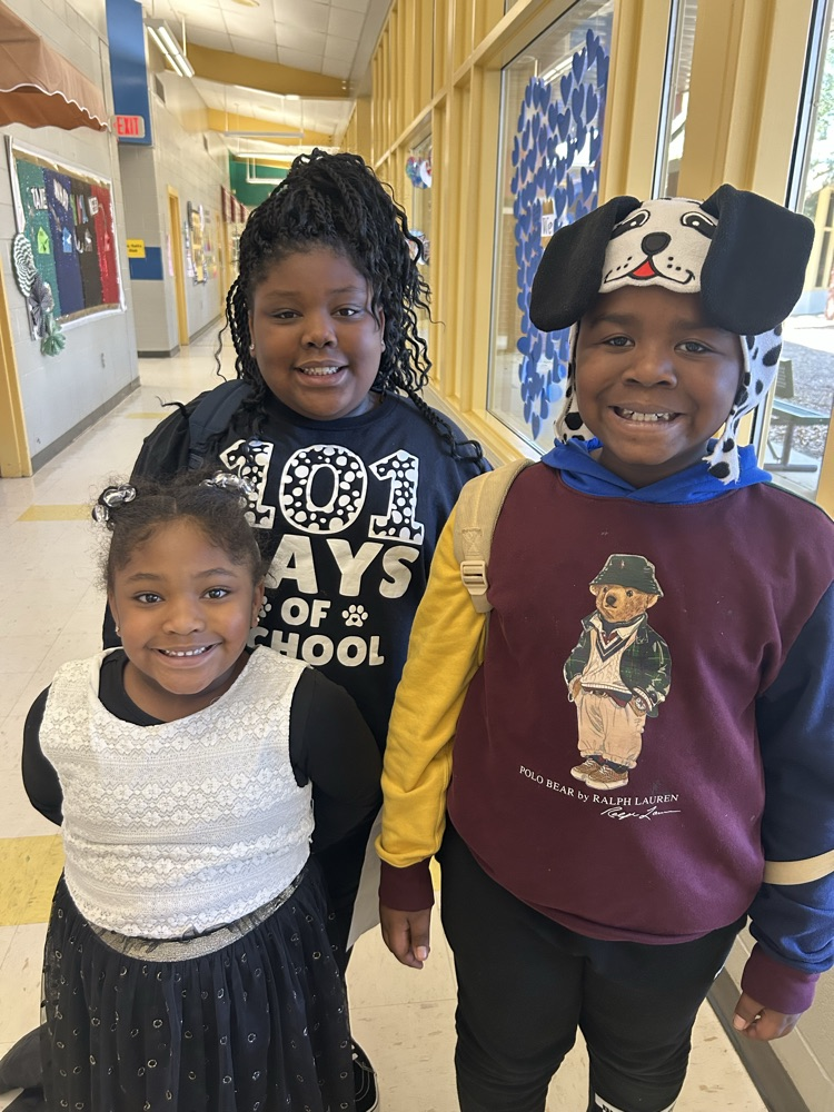 dressed as Dalmatians with black and white spots