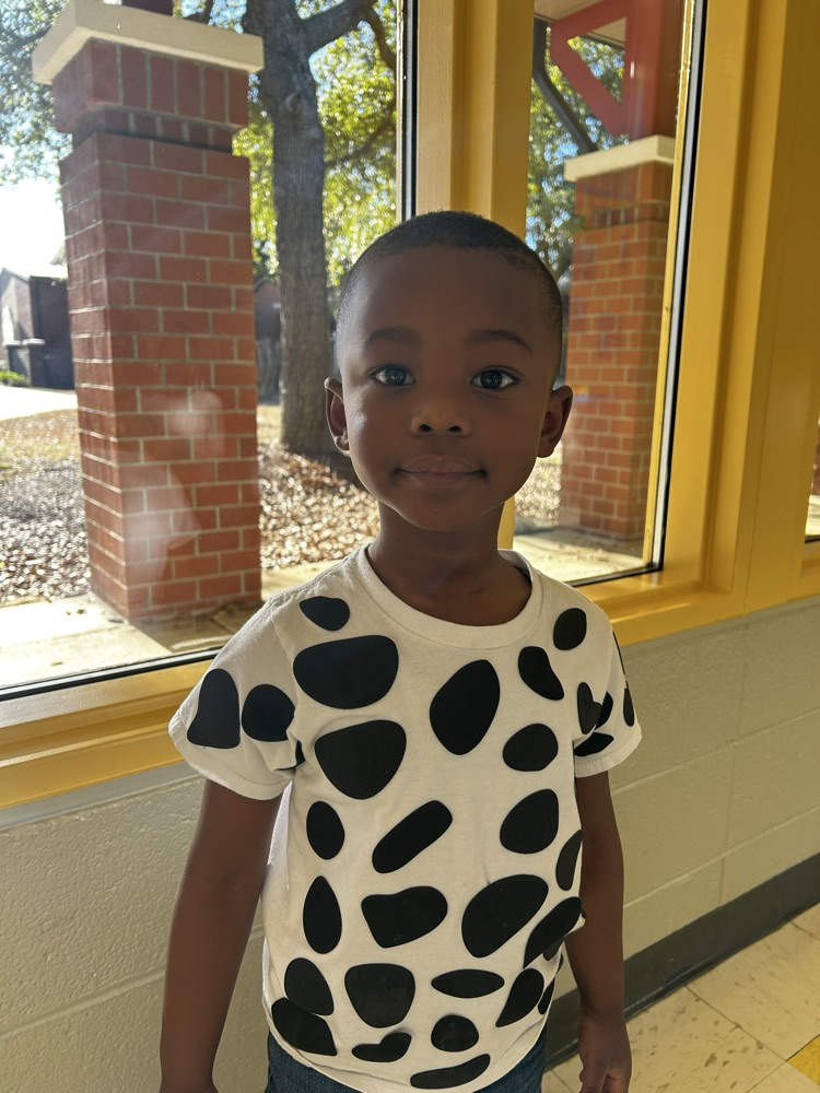 dressed as Dalmatians with black and white spots
