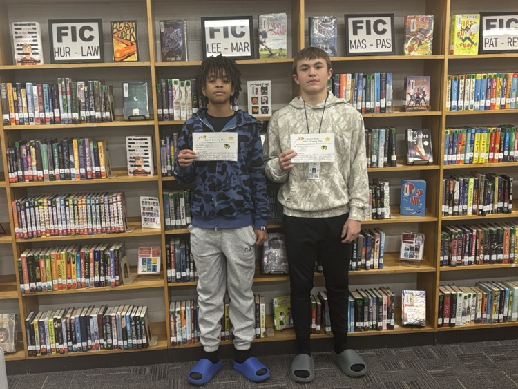 students holding a certificate 