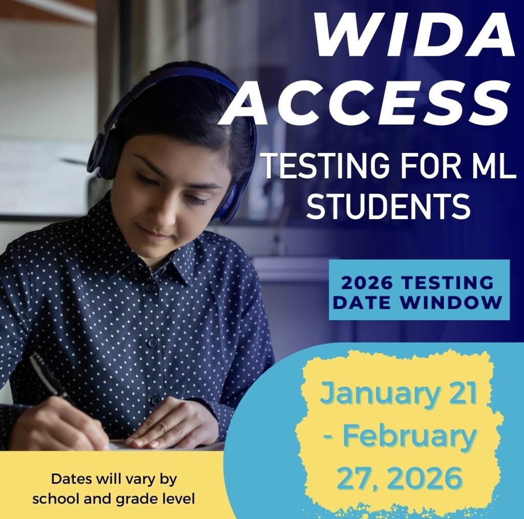 Girl with headphones looking down writing at a table.