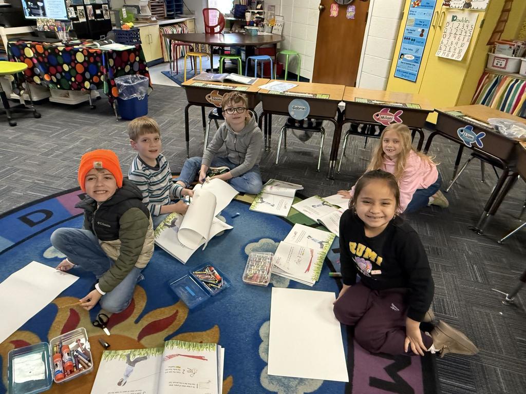 First Graders Working together to create a project 