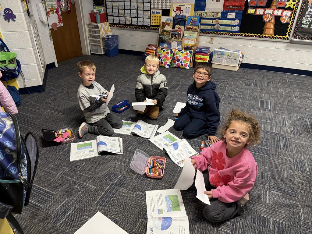 First Graders Working together to create a project 