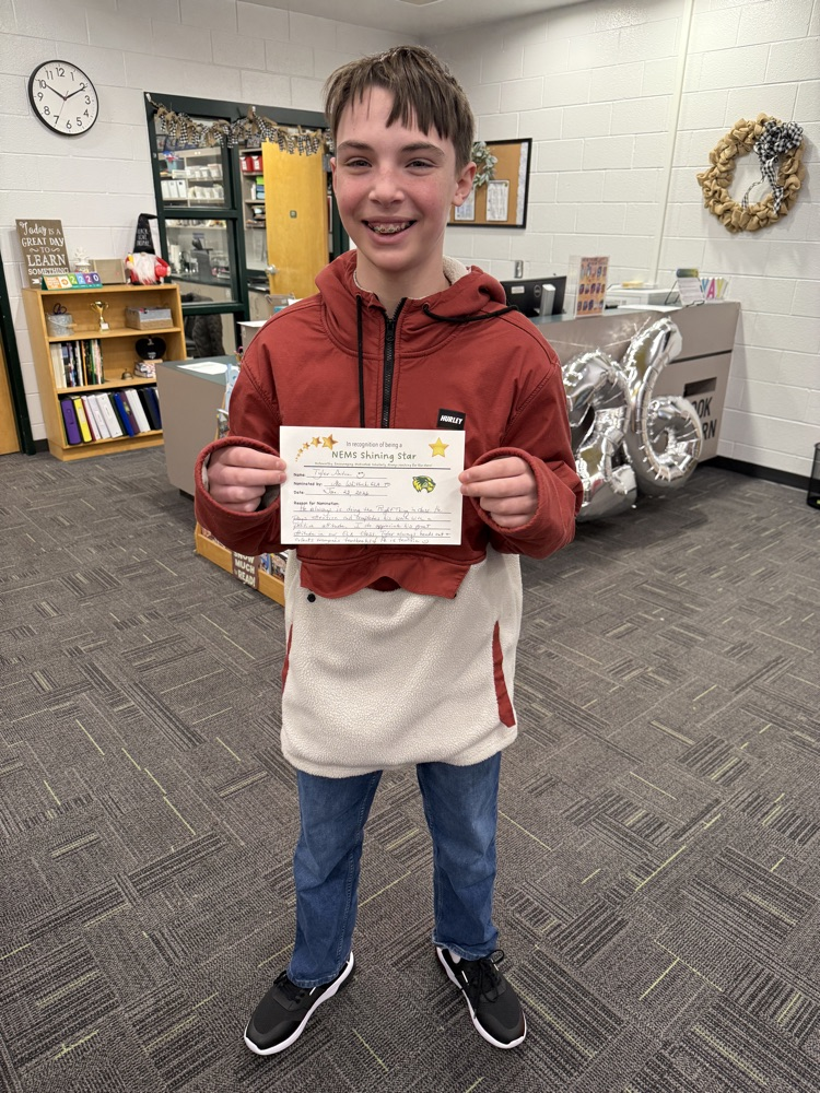 student holding a certificate 