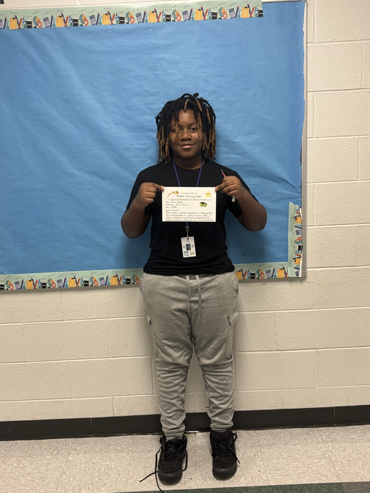 student holding a certificate 