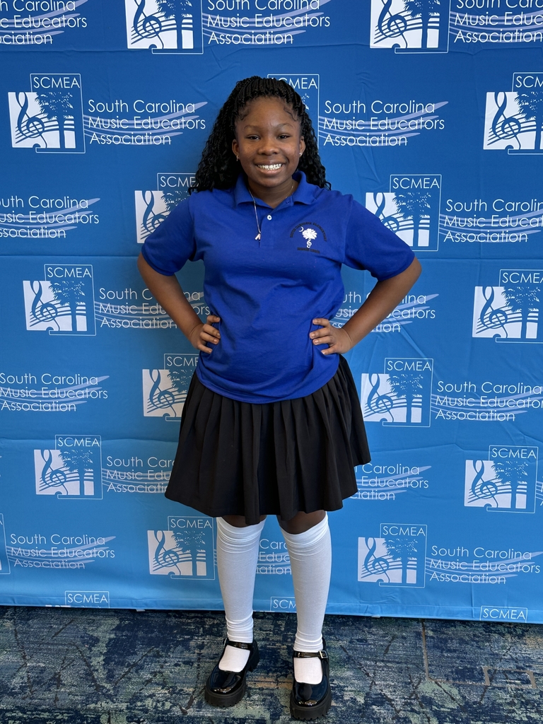 Macee in front of the SCMEA backdrop