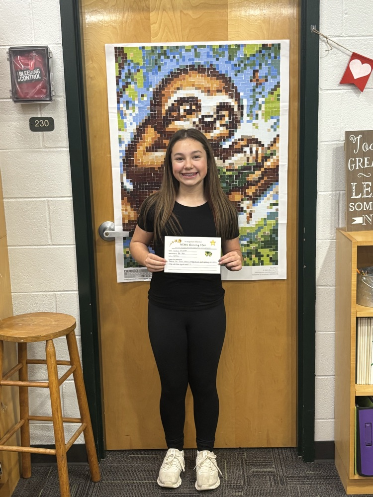 student holding certificate 