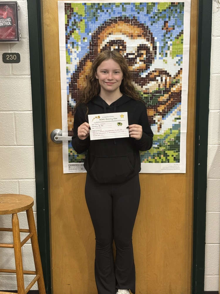 student holding certificate 