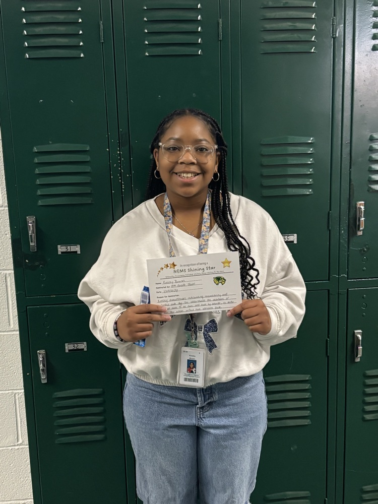 student holding certificate 