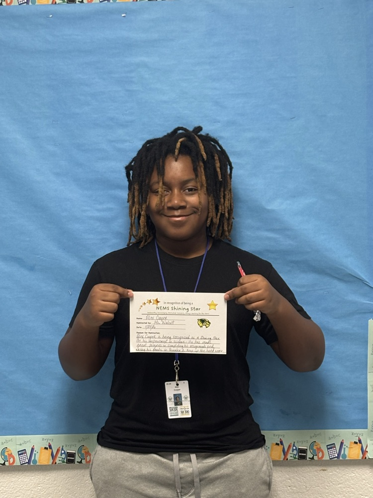student holding certificate 