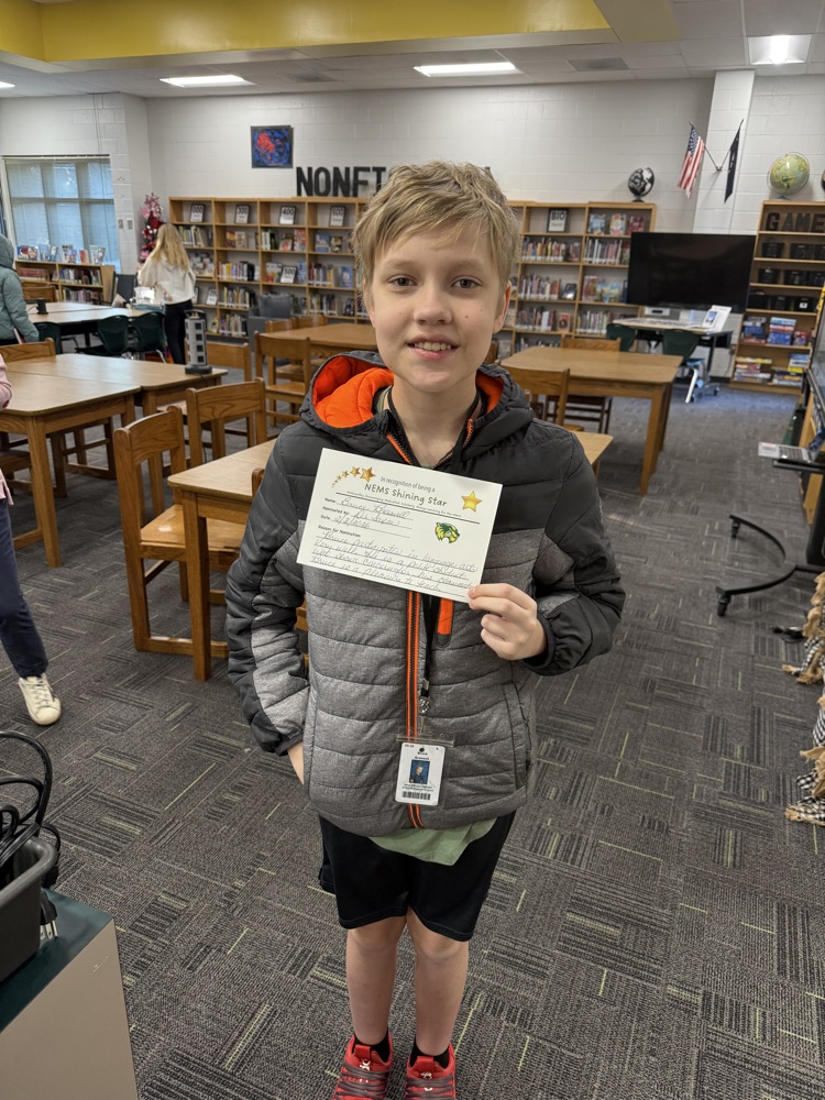 student holding certificate 