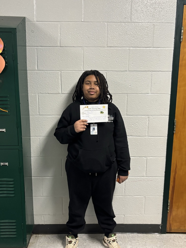 student holding certificate 