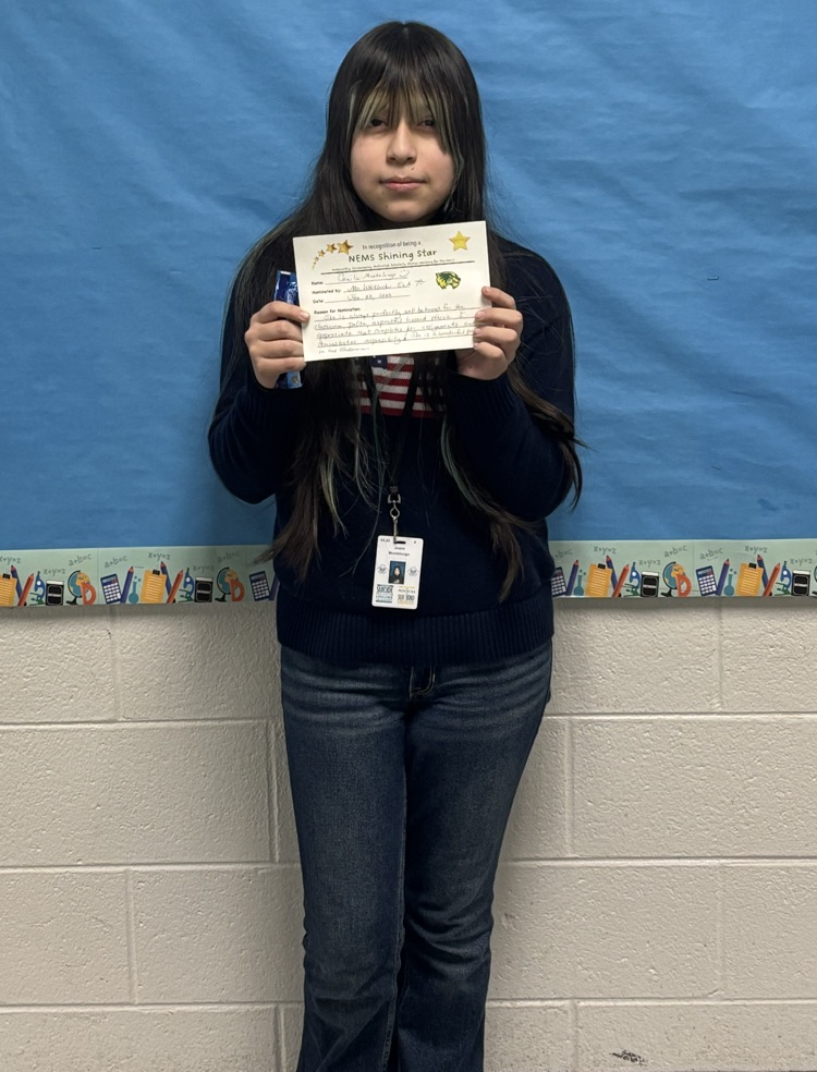 student holding certificate 