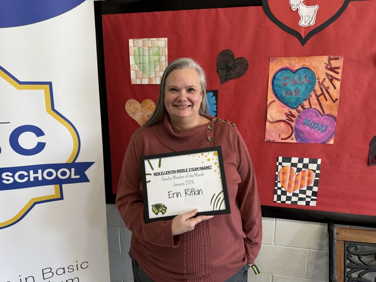 teacher  holding certificate 